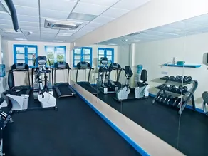 Relaxing Suite Stay Near the Beach! Kitchen, Free Parking, Onsite Pool, & Gym! - Image 3