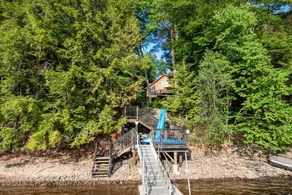 Whimsical Lakefront Chalet - Image 2