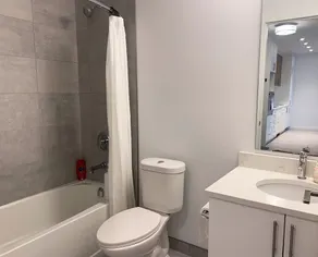 Cozy 1BR Condo w/ In-Suite Laundry, Gym, Free Parking and Full Kitchen - Image 2