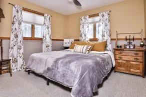 Lakefront home on Big Saint Germain Lake with dock, enclosed porch, and fire pit - Image 4