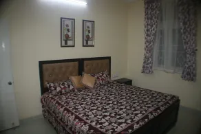 3 BHK Beautifully Furnished Apartment with Kitchen and attached Bath rooms. - Image 4