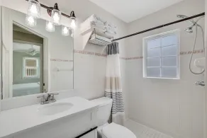 A tranquil seaside escape just steps to the beach - Image 4
