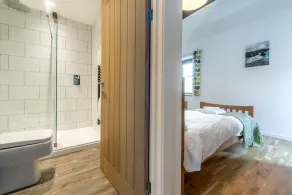 A spacious and beautifully renovated barn conversion with three bedrooms. - Image 4