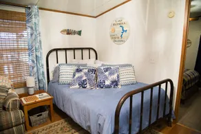 Lake front retreat, covered boat dock, large deck, fenced play area, RV parking - Image 4
