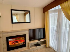 Lotus 2 bedroom dog friendly caravan with veranda offers a stunning sea view. - Image 4