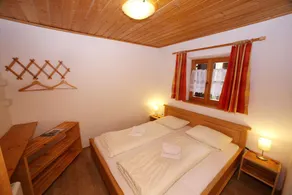 Staudi's ski hut vacation apartment Top1 in hut style directly on the slopes Stove - Image 2