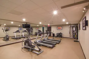 Suite 4-Mins from Airport | Fitness Center + Pool - Image 2