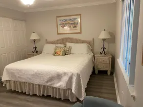 Beach across the road, pool a few steps out the door of this charming cottage. - Image 4