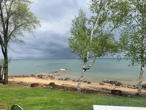 View glorious sunrises and sunsets from this cozy cabin right on Lake Huron! 🌅 - Image 3