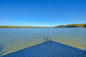 Lakefront home with private hot tub, WiFi, fun rec room, & beach area - Image 2