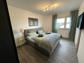 Modern and centrally located holiday apartment with a large balcony. - Image 4