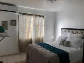 Nana’s Blue Beach Apartment is breazy, cozy and just minutes from the beach. - Image 3
