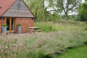 Light and airy stylish barn conversion set in peaceful countryside. - Image 3