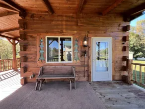 Relax at The Lincoln Log Cabin perched along the Jump River. - Image 2