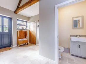 In this stunning cottage, the serene country life of Cotswold awaits you. - Image 4