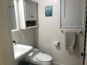 Stylish and Bright unit across the street from the beach at half the cost! - Image 3