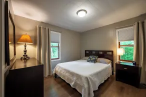 Retreat on a wooded lot within walking distance of downtown! - Image 3