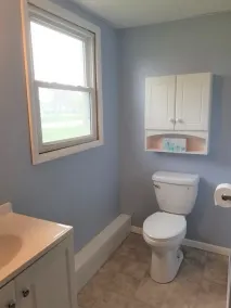 Open concept 2 bedroom ranch with attached garage and deck - Image 4