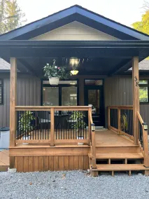 Lakewood Haven is a charming 4-bedroom cottage nestled in by the waterfront. - Image 4