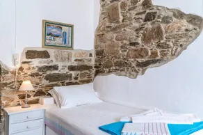 Maison de vacances 'Apano Vrysi Tinos 3' avec terrasse partagée, Wi-Fi et climatisation - Image 4