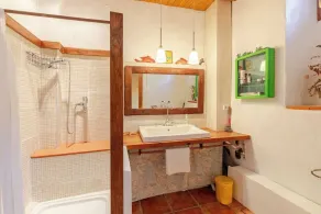 Room with private bathroom and living room in a rural house - Image 5