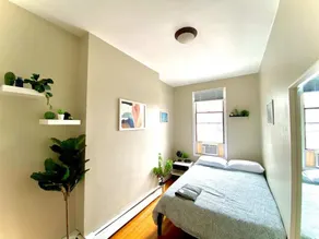 Modern & Sunny FamFriendly 2BR Home, 1 stop to NYC - Image 4