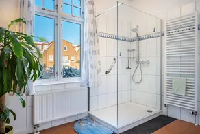 Appartamento 'Haus Übersee Wohnung Timbuktu' con giardino in comune e Wi-Fi - Image 4