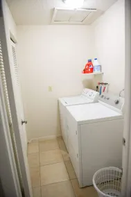 Bright 2-bed, 1-bath condo in the heart of Indian Rocks Beach, just a 2-min walk to the sand and steps from local cafés & shops. Enjoy a shared POOL, private balcony, washer/dryer, free parking — ideal for couples, friends, families & pet-friendly! - Image 2
