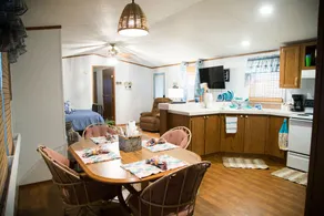 Lake front retreat, covered boat dock, large deck, fenced play area, RV parking - Image 3