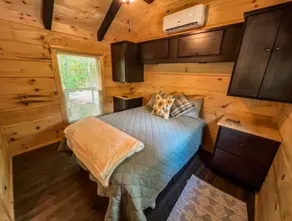 Secluded cozy tiny cabin on the water with fire pit and private dock - Image 3