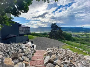 Campo de golfe, montanhas e vista para o lago Stepping Stones Retreat - Image 5