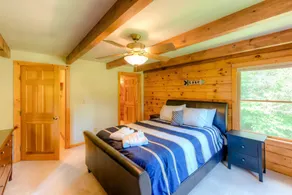 Three-story dog-friendly home with large deck, wood swing, firepit, lawn, & more - Image 4