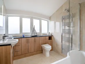 This stunning waterside home offers an amazing space for families and friends. - Image 2