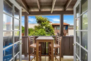 North PB Jewel: Sun-Soaked Second Story, Steps to Beach & Tourmaline Surfing - Image 3