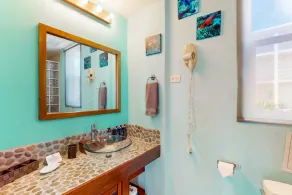 Vibrant, colorful lagoon-front suite with pool access, scenic patio, & W/D - Image 2
