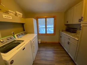 Lakefront 4 Bedroom 2.5 Bath Hot Tub, Firepit, Dock, Deck and great backyard! - Image 2