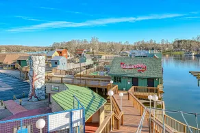 Sunset Cove - Waterways lakefront retreat with boat slip, pool & beach - dogs OK - Image 2