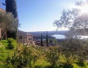 Casa in pietra con terrazza e giardino fronte lago - Image 4