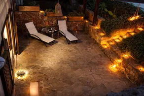 Casina Matilde is a charming retreat carved into an ancient tuff quarry, with walls that tell stories from distant times. This gem, featuring its characteristic barrel vaults, offers a bright furnished veranda for moments of pure stillness, a spacious ro - Image 5