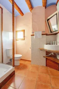 Room with private bathroom and living room in a rural house - Image 3