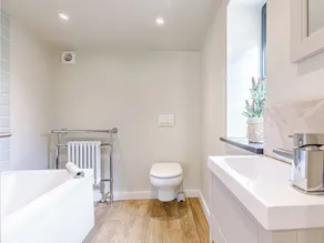 In this stunning cottage, the serene country life of Cotswold awaits you. - Image 2