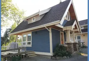 Beautiful modern cottage with fireplace and large deck at Currents at Otter Bay. - Image 5