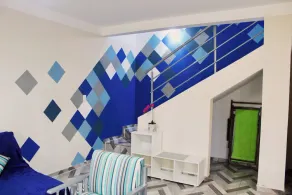 Maison Orchidée : Un refuge confortable pour les familles dans un cadre serein - Image 2