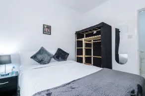 65 Inch TV & Luxurious 2 Bedroom Suite for Your Ultimate Getaway - Image 5