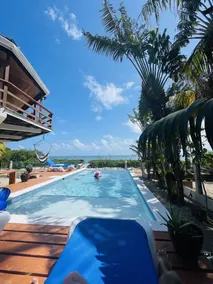 OCEANFRONT ECO-CHIC HOME WITH INFINITY POOL, DOCK, AIR CONDITIONER & TV - Image 4