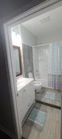 Cozy bedroom with private bathroom, and separate, direct access entrance. - Image 4