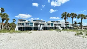 LaPlaya 101A - Step out to the beach from your screened lanai. Light and bright end unit. - Image 2