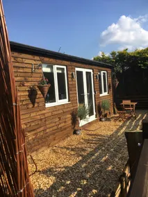 Lovely Wooden Lodge,  views over an orchard, outside seating. - Image 4