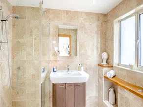 This stunning waterside home offers an amazing space for families and friends. - Image 3