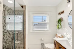 Updated home across from beach with covered balcony, central AC, & washer/dryer - Image 5